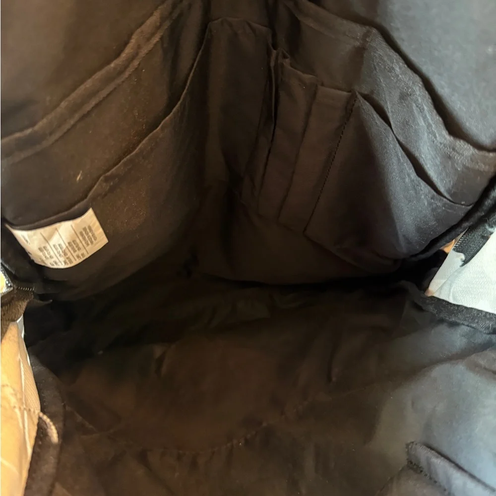 Nike Black and Gray Swoosh Logo Pattern Backpack